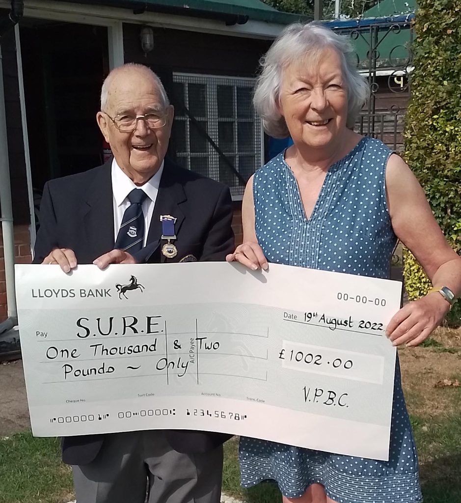 Carole Summerfield accepting cheque from Victoria Park Bowling Club Quizz