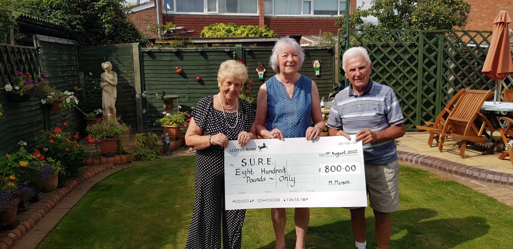 Margaret & Graham Marson coffee & cake £800 cheque presentation