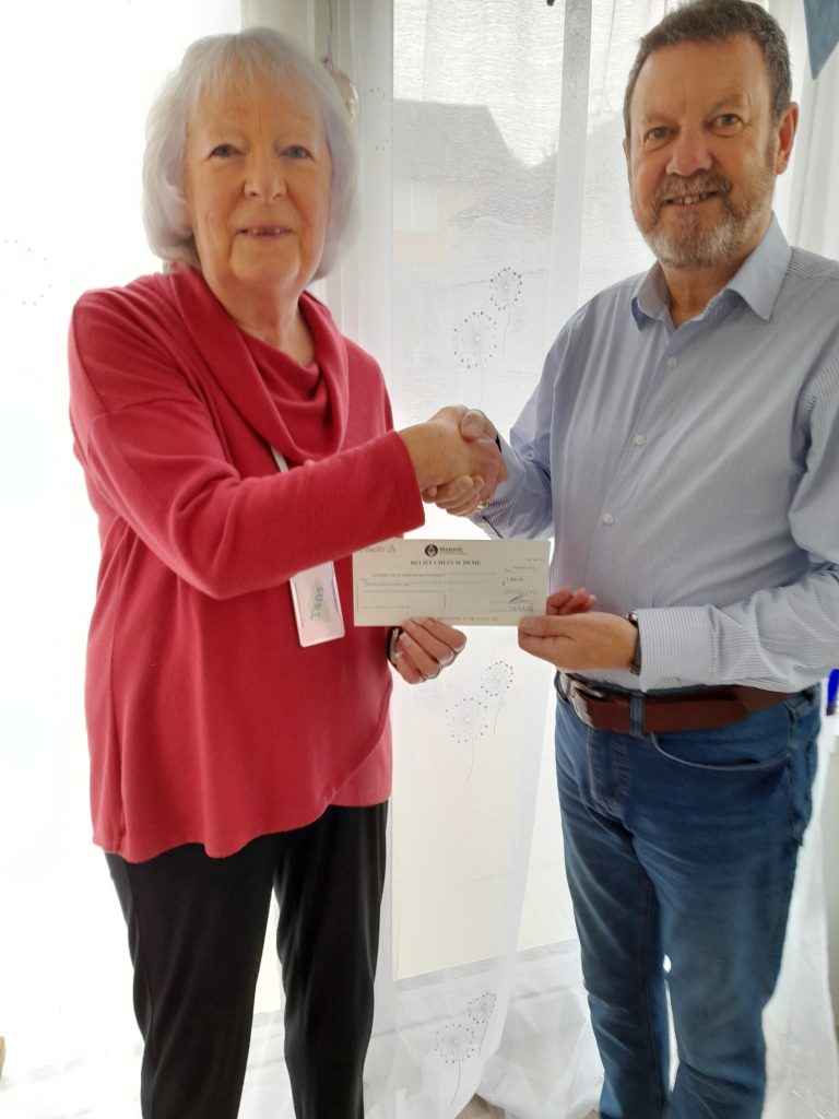 cheque presentation for £1,000 from Carl Caswell, Worshipful Master of Mason's L329, Lodge of Brotherley Love, based in Yeovil.